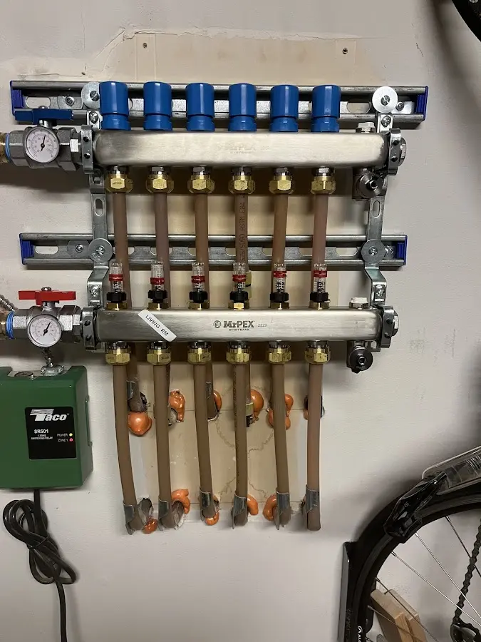 Plumber performing Water Heater Repair at a residential property in Randleman